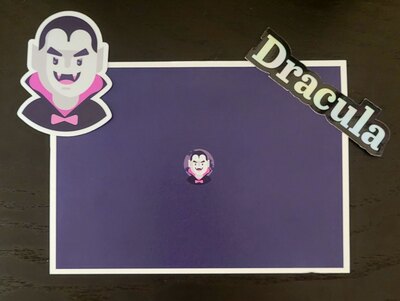 Card and stickers with the Dracula logo for draculatheme.com